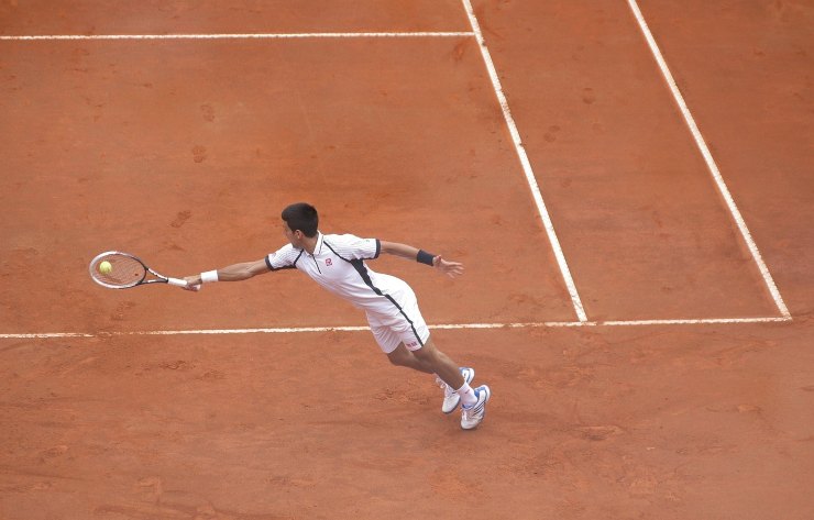 Tennis giocatore su terra rossa